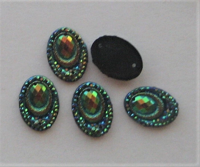 CRAFT-SCRAPBOOK-CABOCHONS 10 x 13x18mm Green/Blue Oval Flat Back Iridescent Eyes - Image 1 of 1