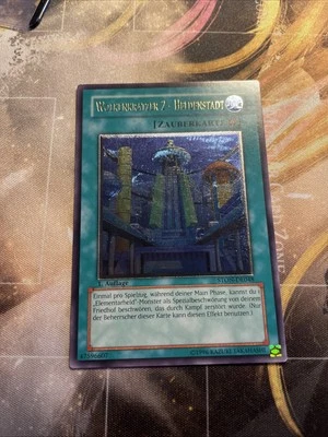 Yu-Gi-Oh! Wolkenkratzer 2 - Heldenstadt STON-DE048 -Ultimate Rare - 1. Auflage - Bild 1 von 4