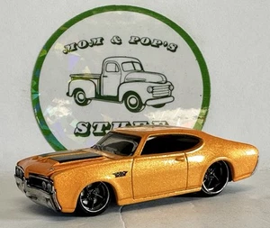 1969 Oldsmobile Cutlass 442 Maisto Motorhaube öffnet Gummireifen perlorange - Bild 1 von 11