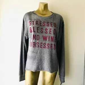 Felpa Lux moderna nuova con etichetta STRESSED BEATED & WINE OSSESSED - Foto 1 di 5