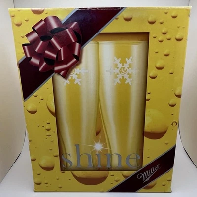 "Juego de 2 vasos de cerveza Pilsner conmemorativos de vacaciones Miller MGD Shine - 8,5"" de alto" Foto 1 de 4