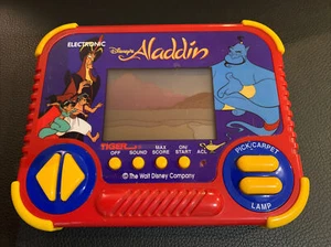 Tiger Electronics Aladdin Handheld Video Game *Not Working for parts only - Bild 1 von 2