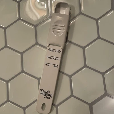 The Pampered Chef White Adjustable Measuring Spoon Tablespoon - Image 1 of 4