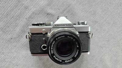Olympus OM-1 MD + Objektiv G.Zuiko Auto-S 1.8 50 Analog Spiegelreflexkamera SLR - Bild 1 von 4