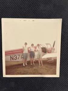 FOUND VINTAGE PHOTO PICTURE People Posing By A Propeller Airplane - Picture 1 of 3