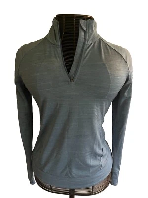 Camisa atlética ReeBok para mujer azul cielo con cremallera en cuarto talla M Foto 1 de 4