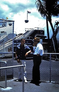 Orig Slide, May 1960, Two Men at Airport next to Airplane Loading Stairs - Picture 1 of 1