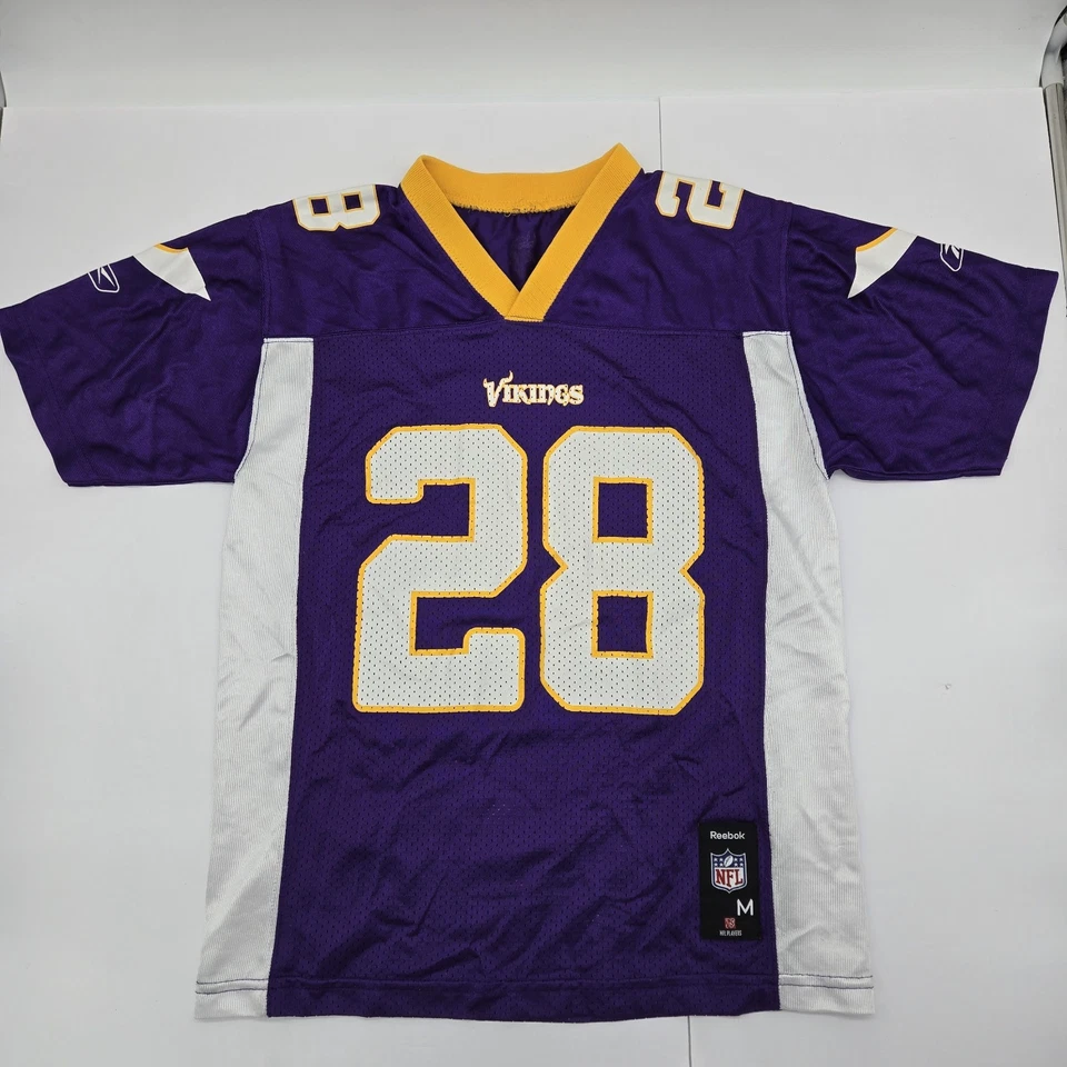 Camiseta deportiva Reebok Vikings Adrian Peterson #28 niños ropa de equipo mediano fútbol americano NFL Foto 1 de 4