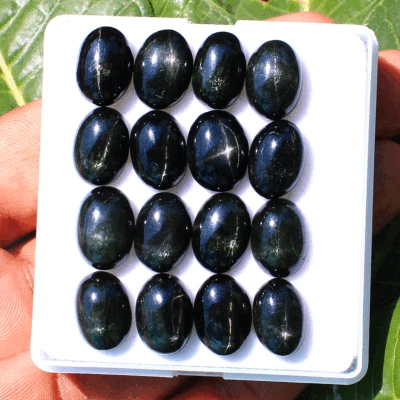 Lote de 10 piedras preciosas cabujón ovalado birmano natural estrella negra diopsido 14 mm x 10 mm Foto 1 de 4