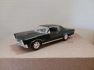 Black 1965 PONTIAC GTO 1:24 Scale Diecast Model Car WELLY - Picture 1 of 6