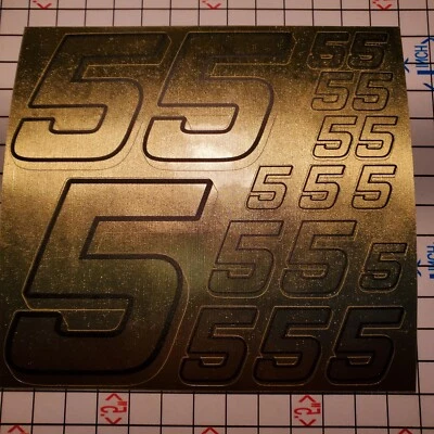 Hoja de calcomanías de vinilo dorado cepillado con números de carreras negros #5 1/10-1/12  Foto 1 de 4