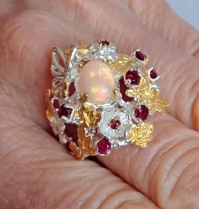 ANELLO IN ARG. STER. 925 RODIATO E DORATO CON OPALE DI WELO E GRANATI NATURALI - Foto 1 di 9