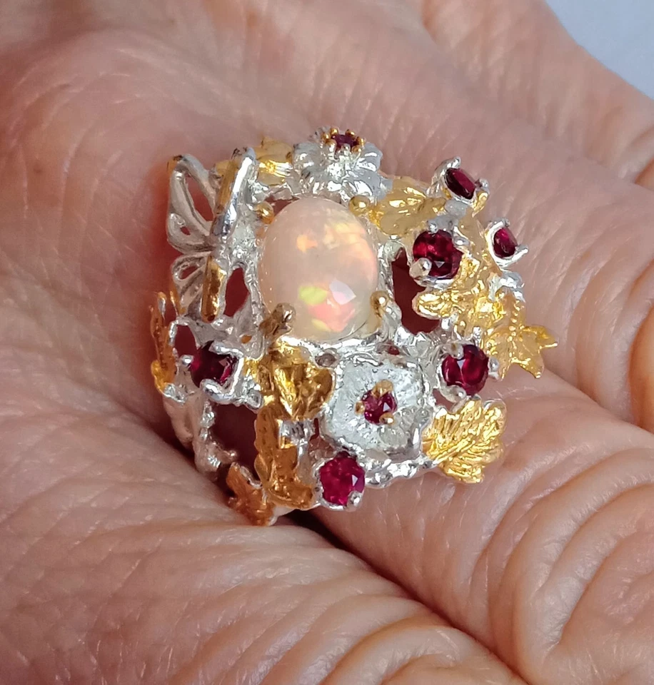 ANELLO IN ARG. STER. 925 RODIATO E DORATO CON OPALE DI WELO E GRANATI NATURALI - Immagine 1 di 4