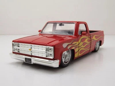 Chevrolet C-10 Pick Up 1985 Rosso Con Fiamme Modellino Auto 1:24 Jada Toys - Immagine 1 di 4