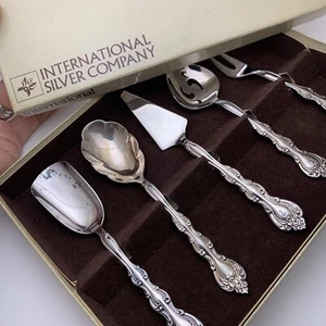 Juego de 5 tenedores y cuchara y servidor de acero inoxidable International Silver Company - Imagen 1 de 12