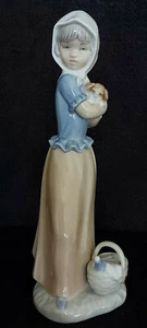 Nao By Lladro Figure Of Girl With Puppy In Arms And Basket At Feet - Picture 1 of 7