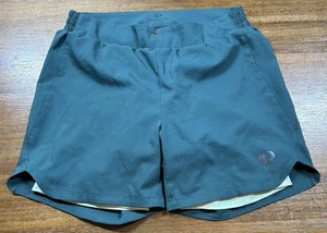 Pearl Izumi Women’s Size 6 Green Compression Lined Padded MTB Loose Fit Shorts - Picture 1 of 5