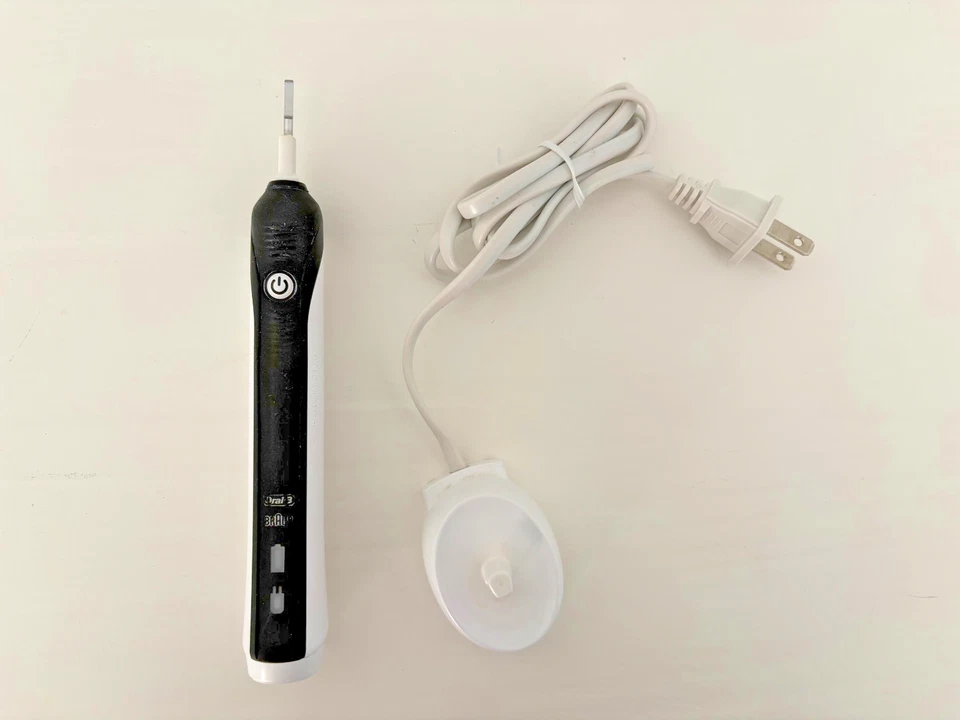 Oral-B Pro 1000 электрическая зубная щетка - черный - включается и заряжается - Изображение 1 из 1