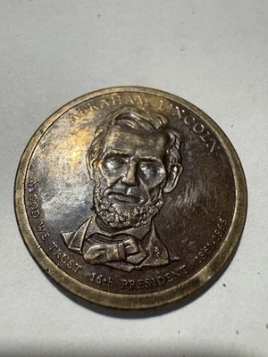 🔥2010 $1 Abraham Lincoln Gold Coin ULTRA RARE Tone off Center Rim Error🔥 - Image 1 of 4