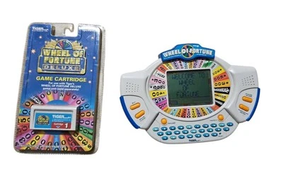 PROBADO Wheel of Fortune Deluxe Juego Portátil Tiger Electronics y Sellado Tiger 1  Foto 1 de 4