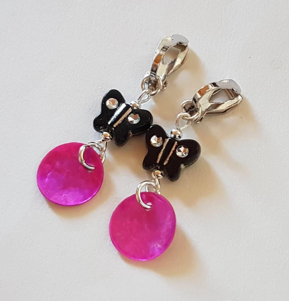 OHRCLIPS  KINDEROHRCLIPS  ZIERLICH PERLMUTT SCHMETTERLING PINK SCHWARZ - Bild 1 von 2