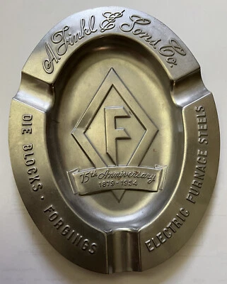 CENICERO A. FINKL & SONS CO. EE. UU. 75 aniversario 1879-1954 ACERO GRABADO de colección Foto 1 de 4