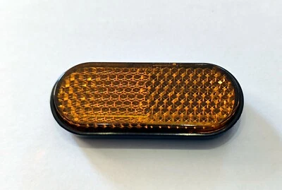Mini Seiten Reflektor Rückstrahler orange Katzenauge selbstklebend KFZ oval - Bild 1 von 2