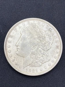 Dólar de plata Morgan 1921-D $1 90 % - Imagen 1 de 2