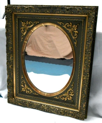 Miroir ovale dans un cadre rectangulaire en bois doré à la feuille d'or - Photo 1/4