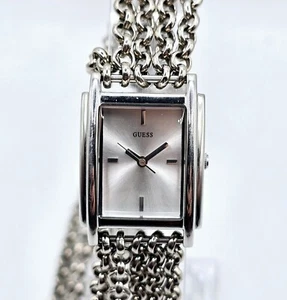 Guess Beautiful Ladies Classic Wrapping Silver-tone Watch - W12104L1 - Picture 1 of 8