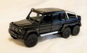 Welly - Modelo escala 1:34 -1:39 Mercedes-Benz G 63 AMG 6x6 negro (BBWE43704DBK) - Imagen 1 de 1