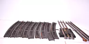 ASSORTIMENTO di BINARI FERROVIARI--1 BINARIO INTERRUTTORE---11 PZ. - Foto 1 di 5