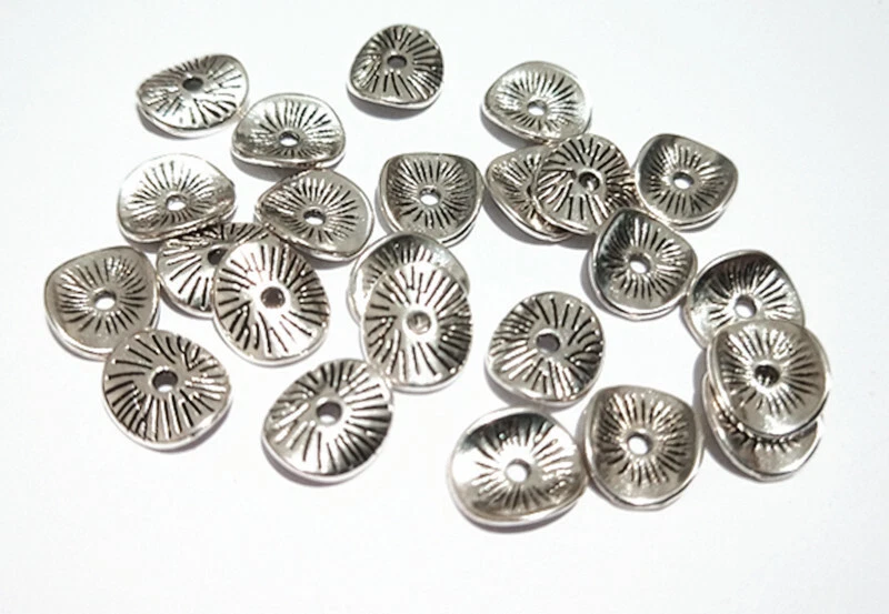 25pz  perline metallo spacer separatori  twist 9x8mm colore argento tibetano  - Immagine 1 di 1