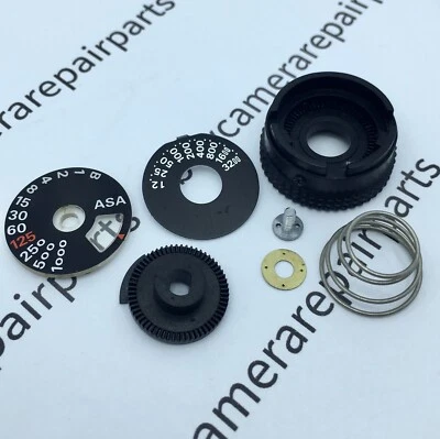 CÁMARA DE PELÍCULA NIKON FM OBTURADOR DIAL RÁPIDO CONJUNTO PIEZA DE REPARACIÓN GENUINA Foto 1 de 3