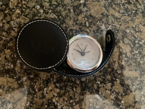 Quartz Travel Clock In Round Case. Approximately 2” Cover