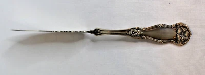 Cuchillo de mantequilla maestro con mango torcido Wm Rogers & Son Arbutus plateado vintage Foto 1 de 4