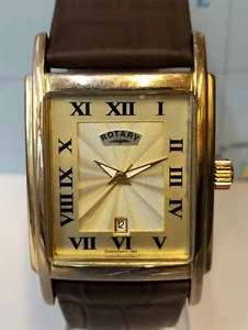 OROLOGIO VINTAGE DA UOMO COMPLETO FUNZIONANTE QUADRANTE ORO QUARZO ROTANTE PLO-008986 - Foto 1 di 20