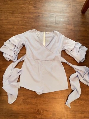 Lindo mameluco blanco floral Agaci Foto 1 de 4