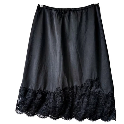 Falda sin cordones Van Raalte vintage negra de nailon con encaje recortada longitud midi para mujer pequeña Foto 1 de 4