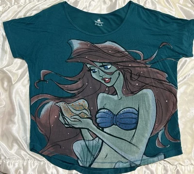 CAMISA SUAVE TURQUESA MANGA CORTA GRANDE SIRENA ARIAL DISNEYPARKS NUEVA SIN ETIQUETAS Foto 1 de 4