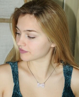 NWT KATE SPADE NEW YORK Sparkling Bow Mini Pendant NECKLACE silver PAVE CRYSTALS - Image 1 of 4