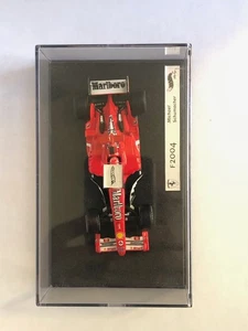 F1 1/43 Hot Wheels Ferrari F2004 N°1 M.Schumacher Winner San Marino GP 2004 - Foto 1 di 6