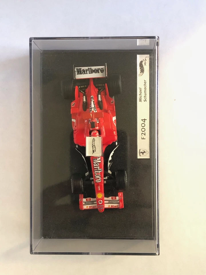 F1 1/43 Hot Wheels Ferrari F2004 N°1 M.Schumacher Winner San Marino GP 2004 - Immagine 1 di 4