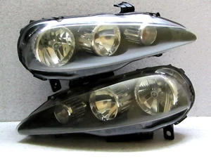2004 2010 ALFA ROMEO 147 ZAR RHD BLK HOUSING HID HEADLIGHT SET FACTORY OEM - Picture 1 of 14
