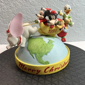 Walt Disney World Christmas 1991 Mickey & Friends Riding Over the World - Picture 1 of 11