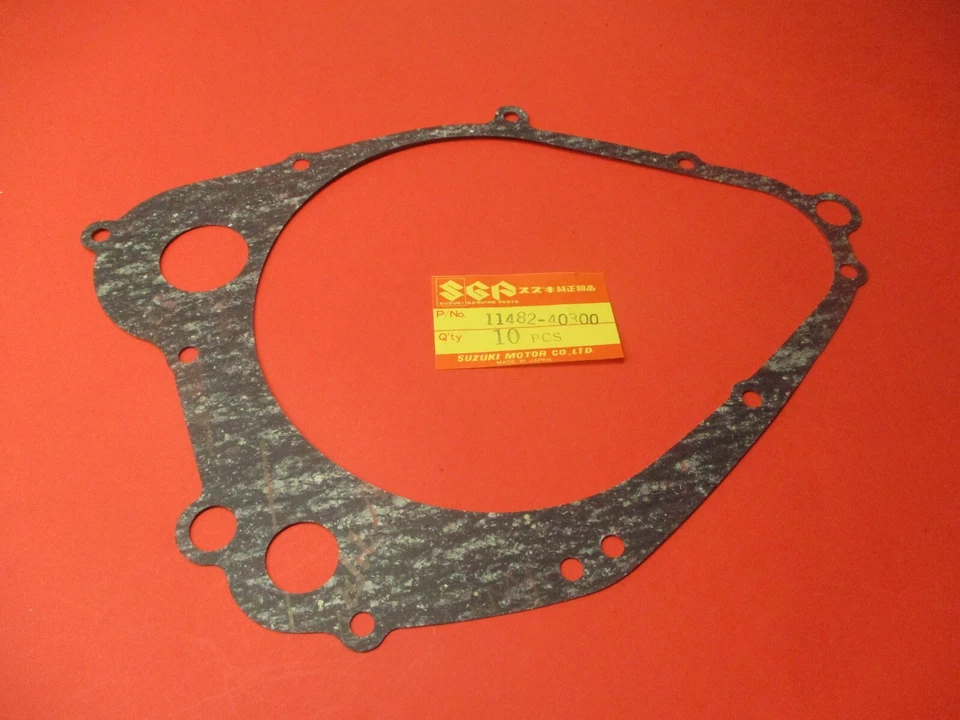 NUEVO DE LOTE ORIGINAL OEM SUZUKI CUBIERTA EMBRAGUE JUNTA PE250 RM250 RS250 11482-40300 Foto 1 de 1
