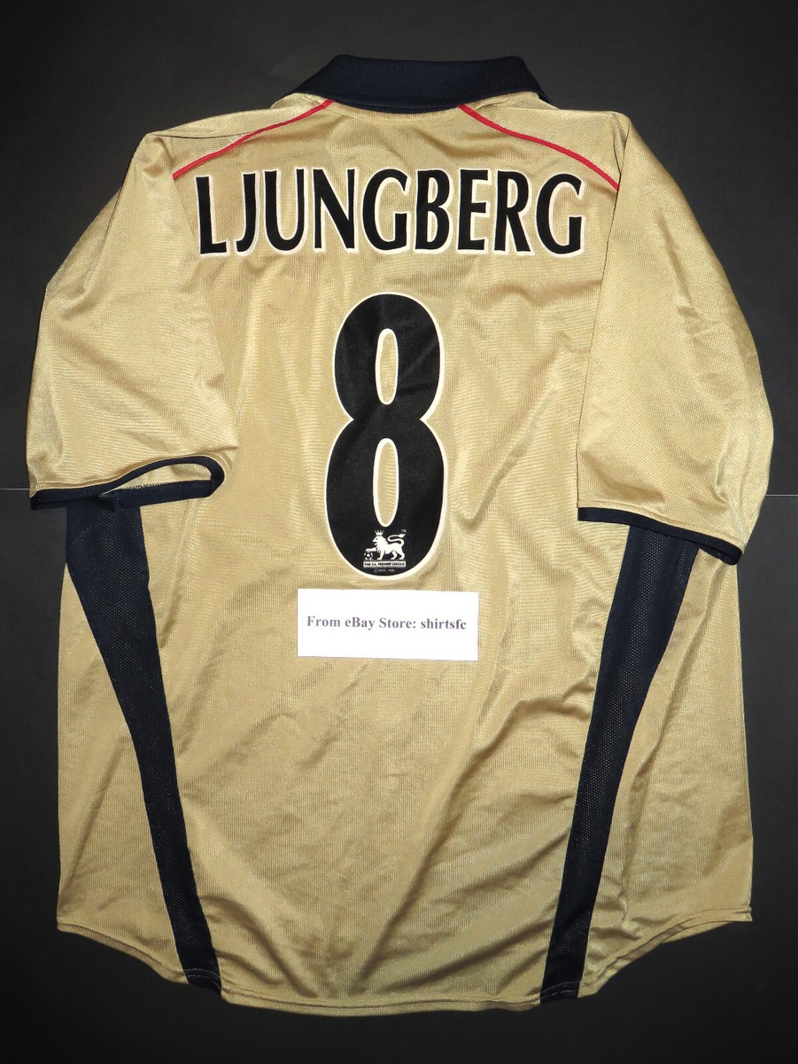 Nike Arsenal Gold International Club Soccer Fan Apparel and Nike Arsenal Gold International Club Soccer Fan Apparel and