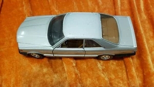 Burago: Mercedes 500 SEC plata gris metálico 1/25 - Imagen 1 de 6