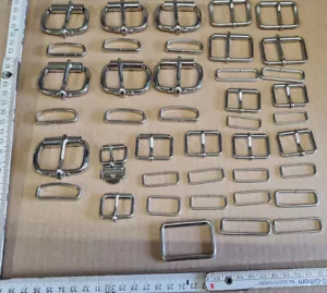 19 Rollschnallen 35mm, 25mm, 20mm, + div. Riemenhalter, verchromt NEU - Bild 1 von 3