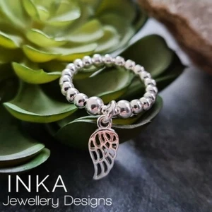 925 Sterling Silver stacking Stretch ring With mini Angel Wing Charm INKA - Picture 1 of 6